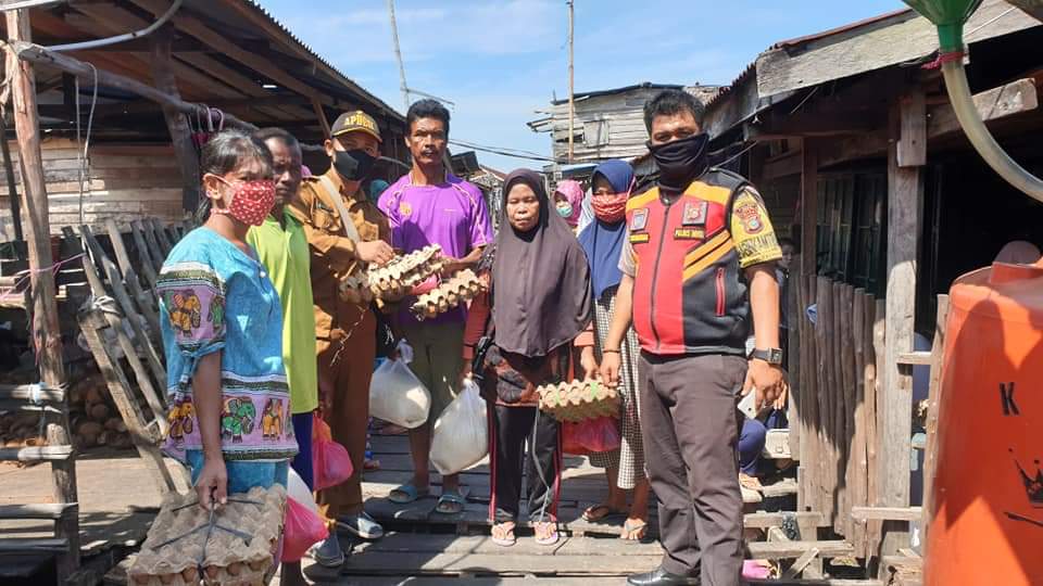 Pemdes Kuala Selat Kembali Salurkan Bantuan BPNT untuk Masyarakat